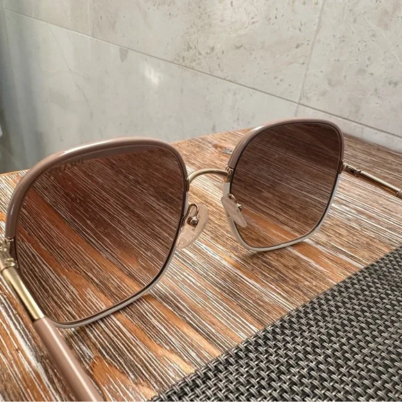 Prada women’s Sunglasses with white & tan frame. - Picture 4 of 7